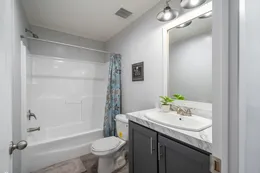 The THE FUSION C Guest Bathroom. This Manufactured Mobile Home features 3 bedrooms and 2 baths.