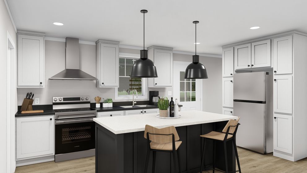 The LET IT BE Kitchen. This Manufactured Mobile Home features 3 bedrooms and 2 baths.