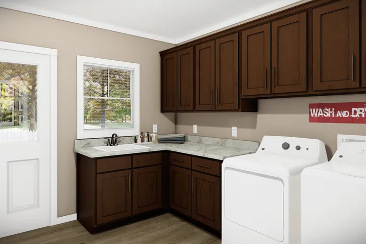 The THE BRYANT Utility Room. This Manufactured Mobile Home features 4 bedrooms and 2 baths.