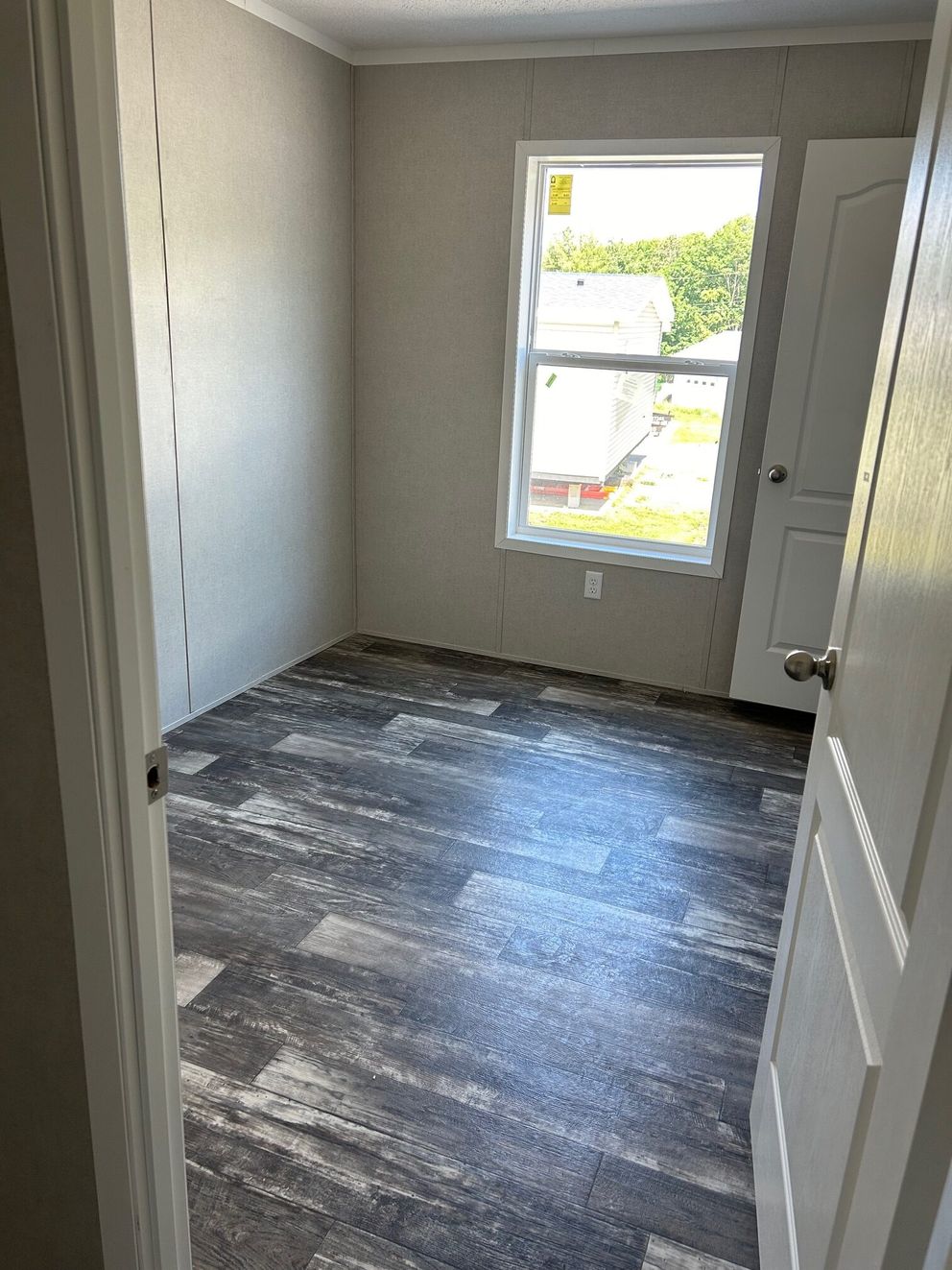 The SAPPHIRE XL 8016-644 Guest Bedroom. This Manufactured Mobile Home features 3 bedrooms and 2 baths.