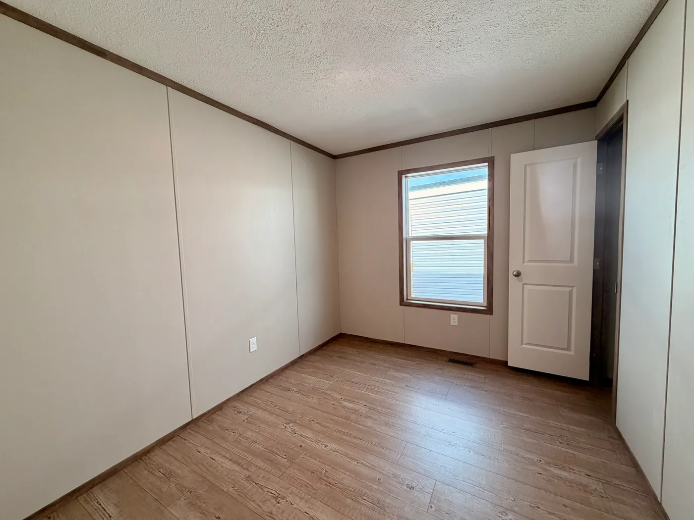 The HUDSON Guest Bedroom. This Manufactured Mobile Home features 3 bedrooms and 2 baths.