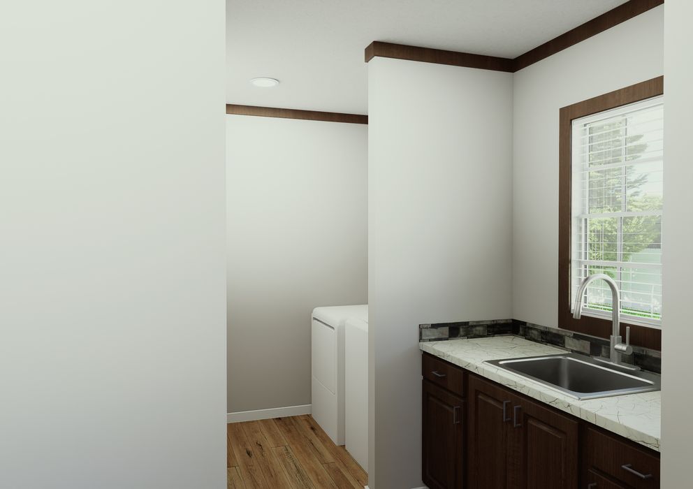 The THE ELITE Utility Room. This Manufactured Mobile Home features 3 bedrooms and 2 baths.