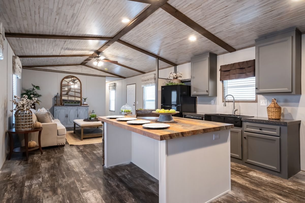 The ALPINE RIDGE Exterior. This Manufactured Mobile Home features 3 bedrooms and 2 baths.