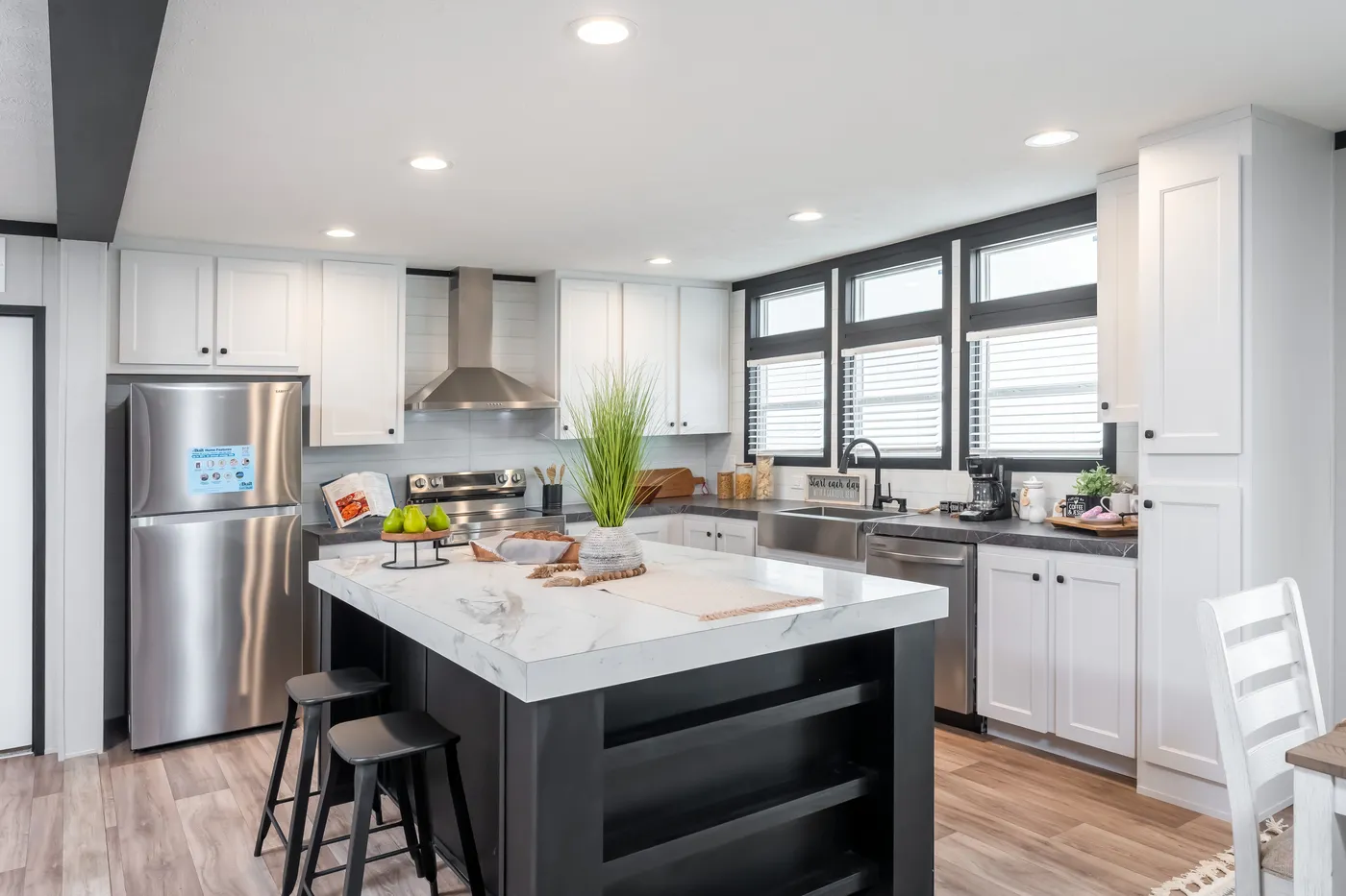 The ABSOLUTE VALUE Kitchen. This Manufactured Mobile Home features 4 bedrooms and 2 baths.