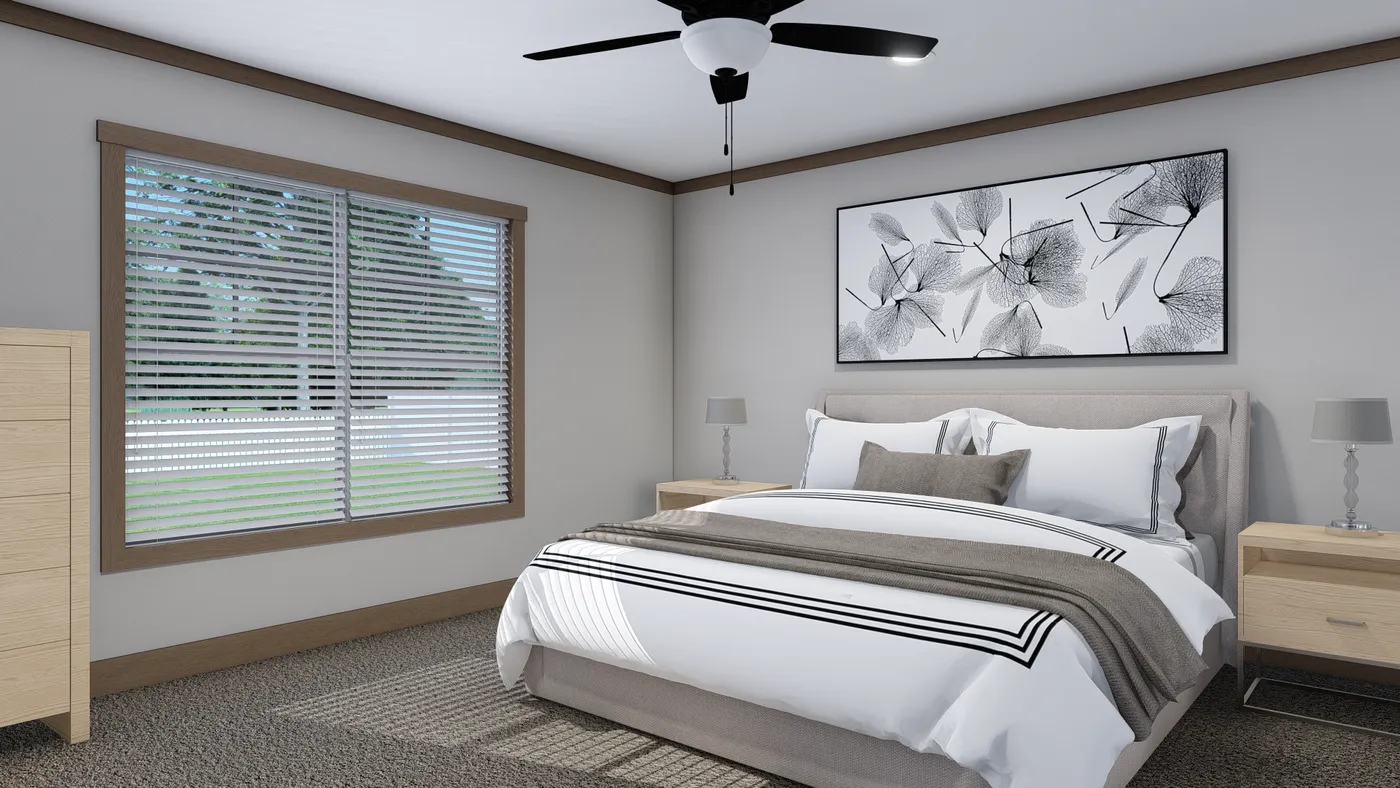 The EVERETT ELITE Primary Bedroom. This Manufactured Mobile Home features 4 bedrooms and 3 baths.