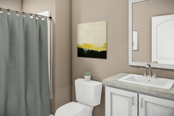 The THE BANDON Guest Bathroom. This Manufactured Mobile Home features 3 bedrooms and 2 baths.