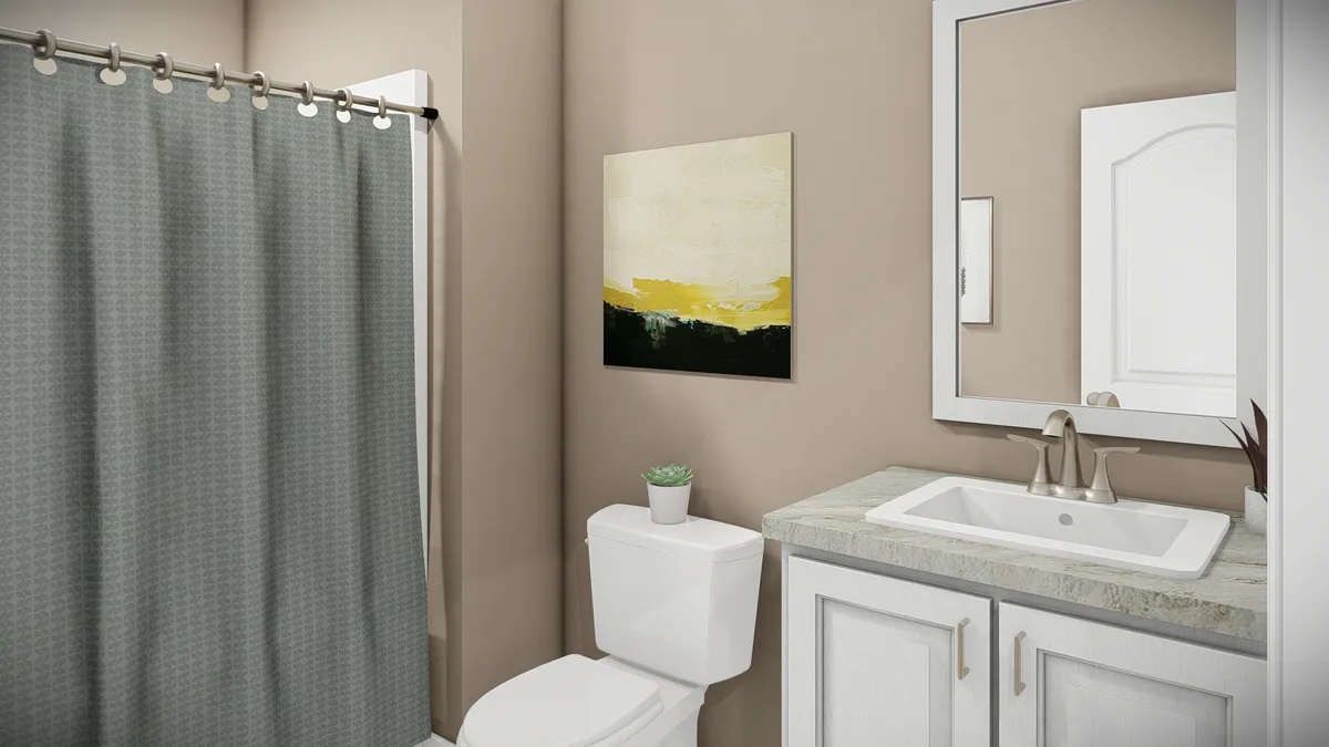 The THE BANDON Guest Bathroom. This Manufactured Mobile Home features 3 bedrooms and 2 baths.