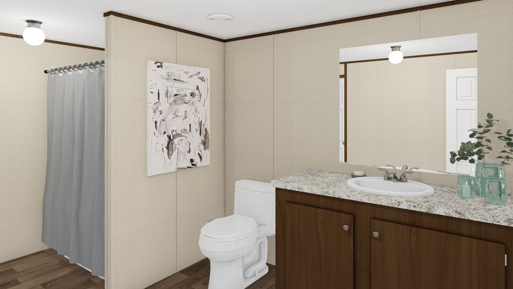 The MARVEL 4 Primary Bathroom. This Manufactured Mobile Home features 4 bedrooms and 2 baths.