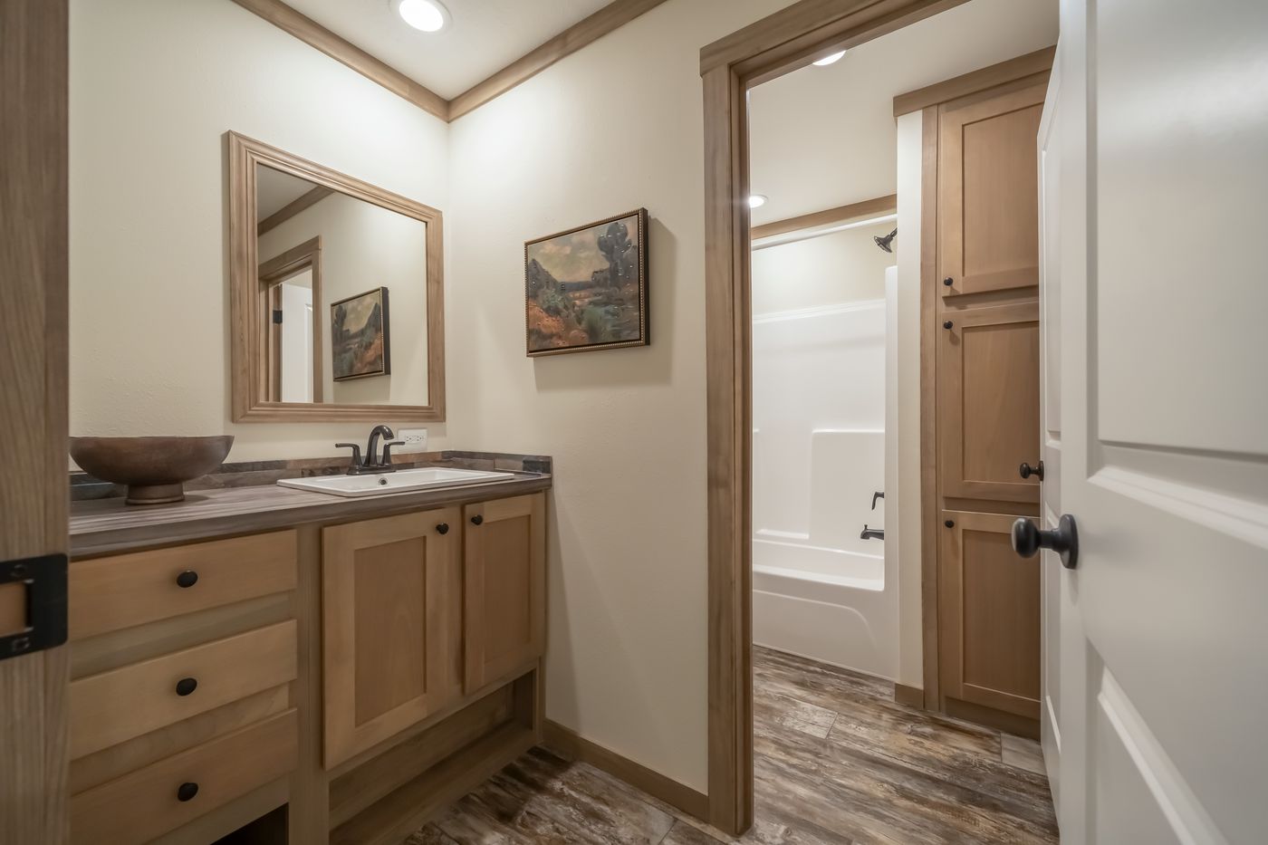 The BOUJEE PREMIER Guest Bathroom. This Manufactured Mobile Home features 4 bedrooms and 2 baths.