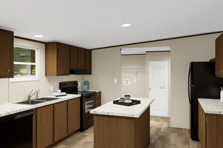 The SATISFACTION Kitchen. This Manufactured Mobile Home features 3 bedrooms and 2 baths.