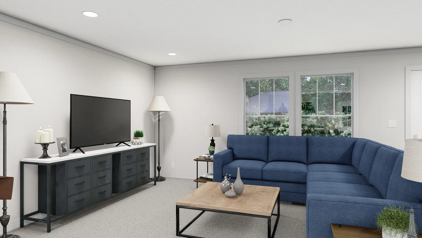 The ROCKET MAN Living Room. This Manufactured Mobile Home features 3 bedrooms and 2 baths.