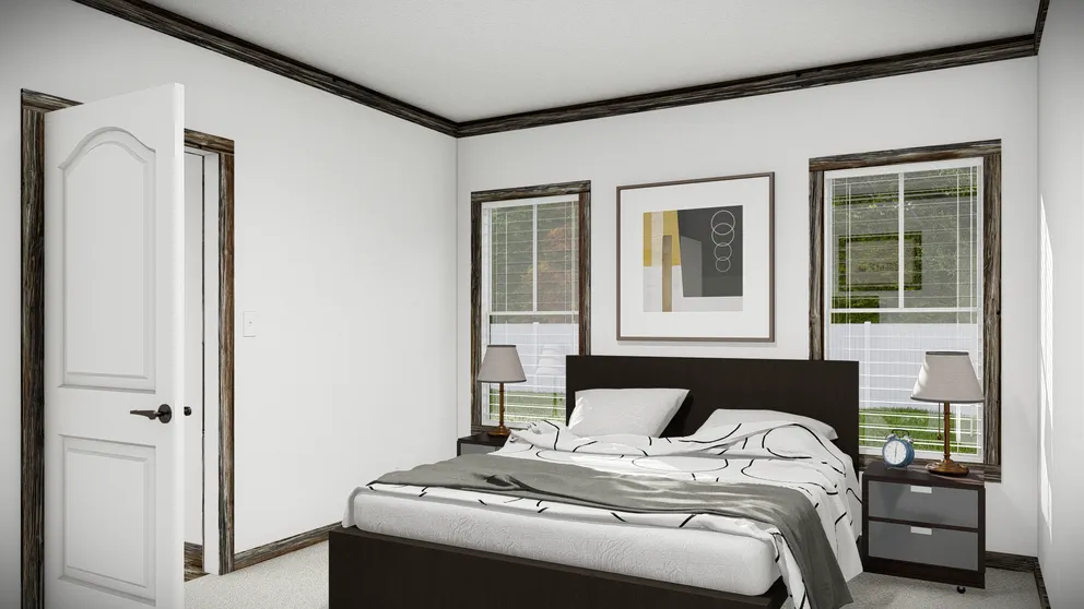 The THE BANDIT Primary Bedroom. This Manufactured Mobile Home features 3 bedrooms and 2 baths.