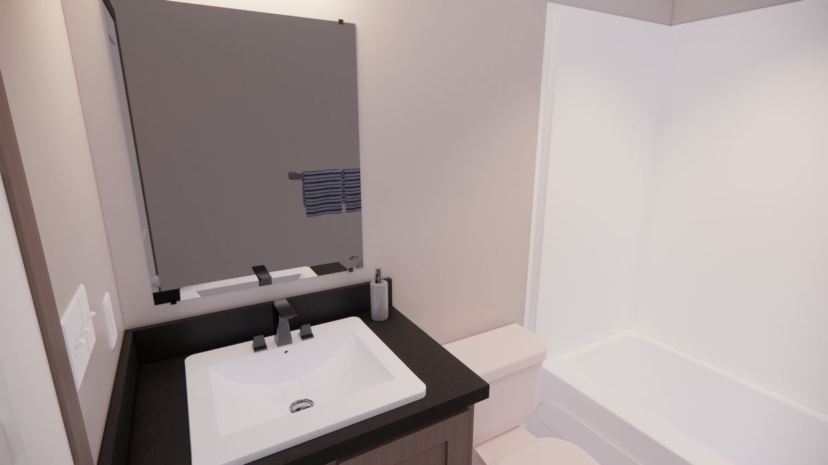 The 7216-4204 ADRENALINE Guest Bathroom. This Manufactured Mobile Home features 3 bedrooms and 2 baths.