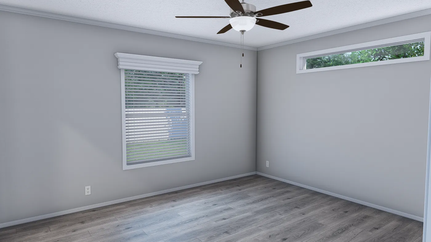 The CATALINA Primary Bedroom. This Manufactured Mobile Home features 3 bedrooms and 2 baths.
