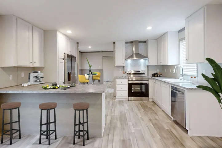 The THE POWERHOUSE Kitchen. This Manufactured Mobile Home features 3 bedrooms and 2 baths.