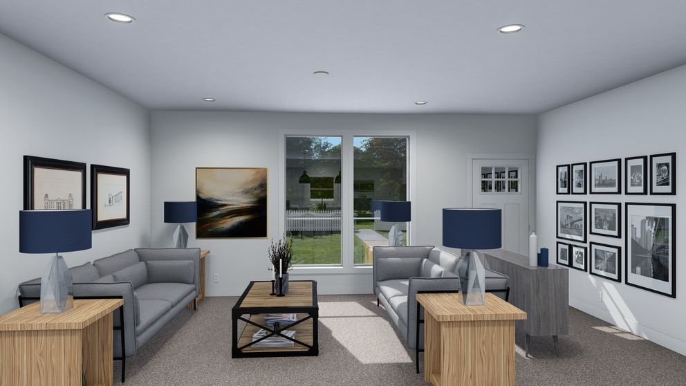 The GRAND Living Room. This Manufactured Mobile Home features 4 bedrooms and 3 baths.