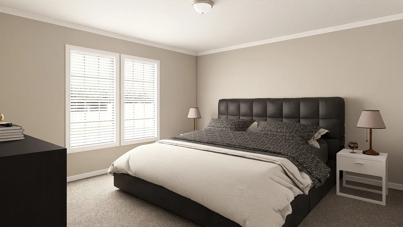 The THE BIG EASY Primary Bedroom. This Manufactured Mobile Home features 4 bedrooms and 3 baths.