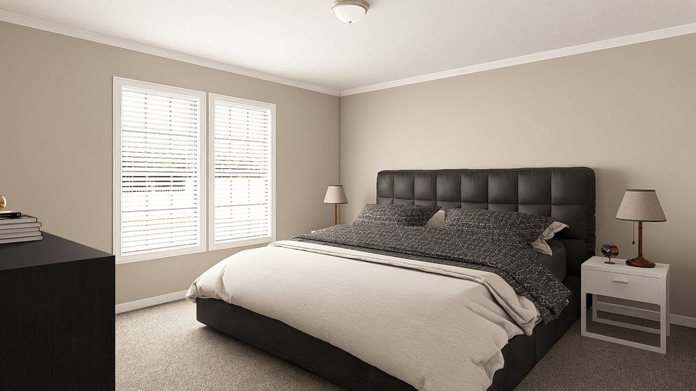 The THE BIG EASY Primary Bedroom. This Manufactured Mobile Home features 4 bedrooms and 3 baths.