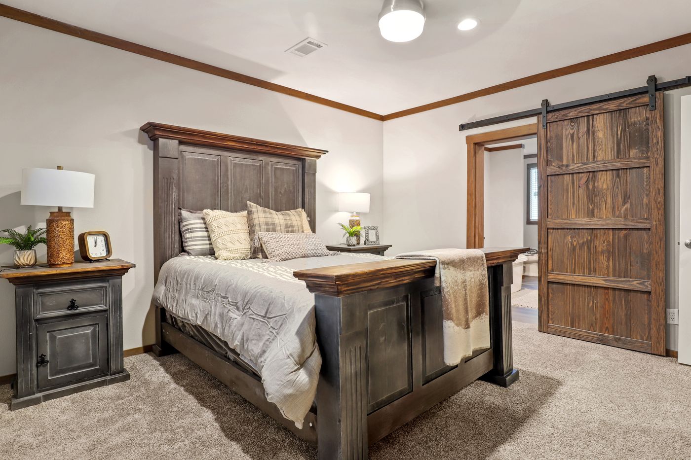The THE DURANGO Primary Bedroom. This Manufactured Mobile Home features 3 bedrooms and 2 baths.