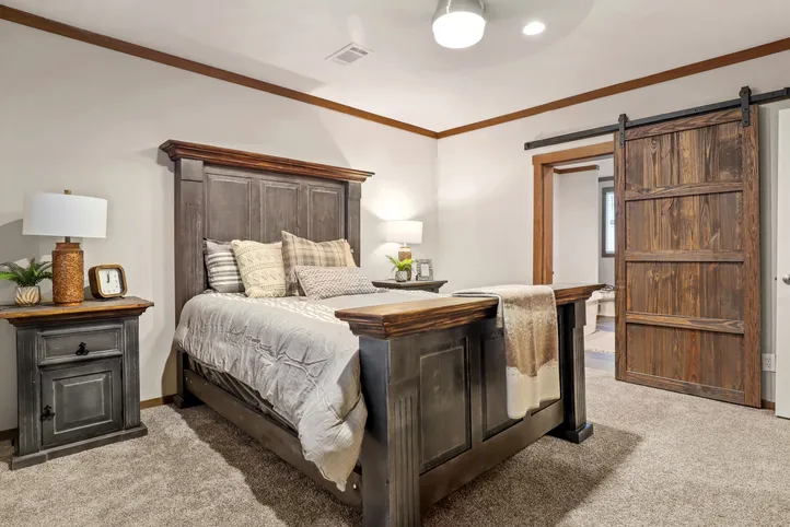 The THE DURANGO Primary Bedroom. This Manufactured Mobile Home features 3 bedrooms and 2 baths.
