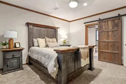 The THE DURANGO Primary Bedroom. This Manufactured Mobile Home features 3 bedrooms and 2 baths.