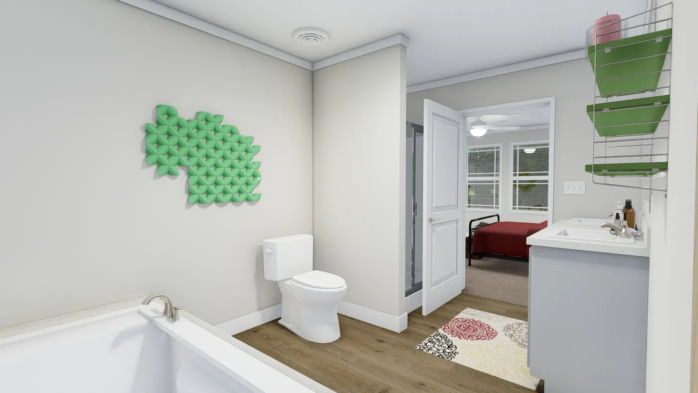 The SUNDANCE 48B Primary Bathroom. This Manufactured Mobile Home features 3 bedrooms and 2 baths.