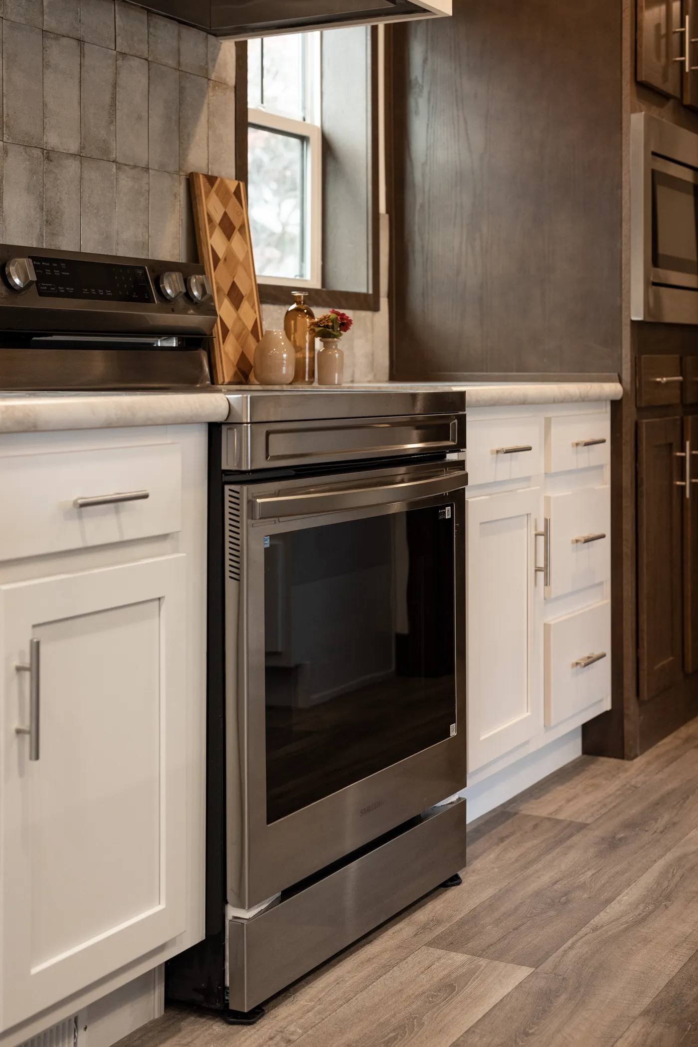 The LEGEND 78 Kitchen. This Manufactured Mobile Home features 3 bedrooms and 2 baths.