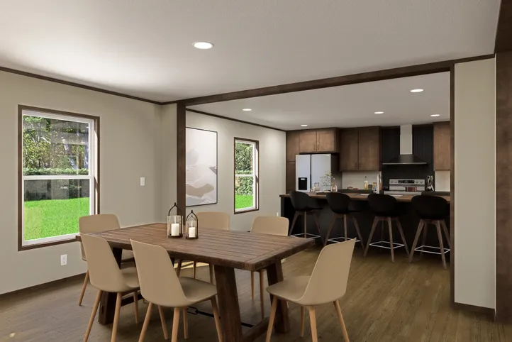 The EVEREST Dining Area. This Manufactured Mobile Home features 4 bedrooms and 2 baths.