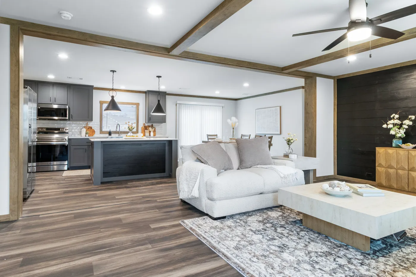 The EVERETT ELITE Living Room. This Manufactured Mobile Home features 4 bedrooms and 3 baths.