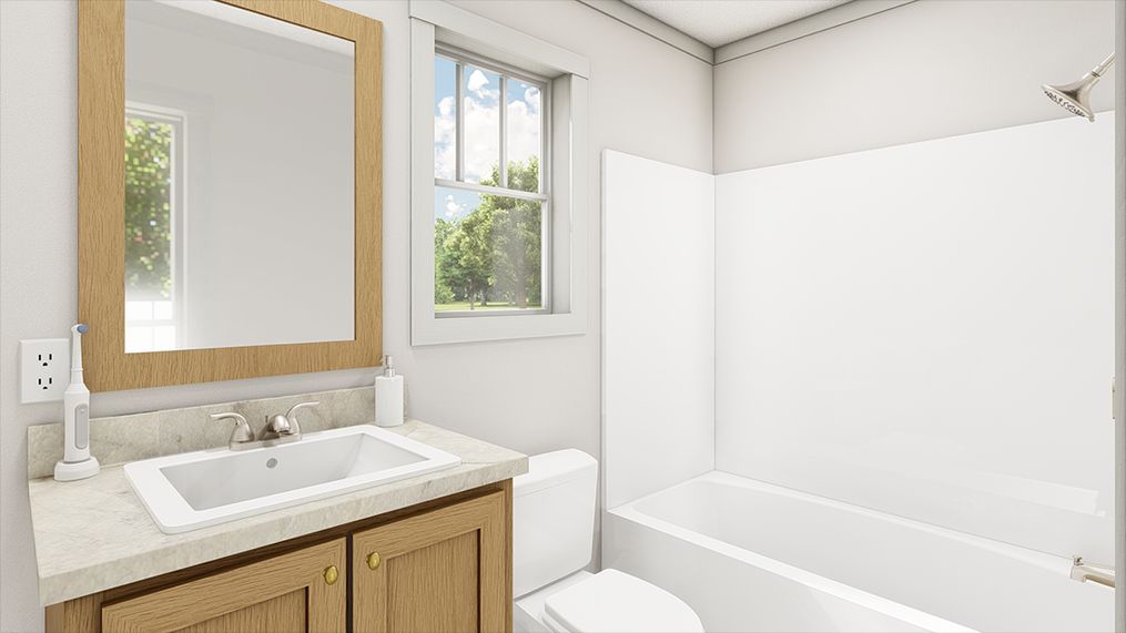 The IMAGINE Primary Bathroom. This Manufactured Mobile Home features 1 bedroom and 1 bath.