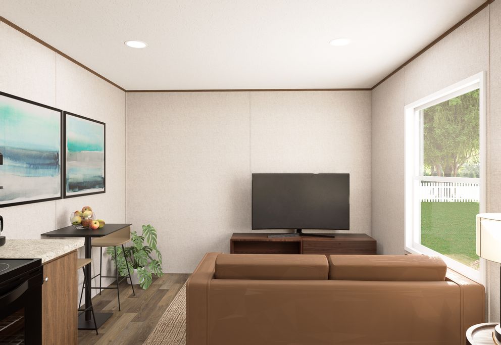 The BUTTERCUP Living Room. This Manufactured Mobile Home features 1 bedroom and 1 bath.