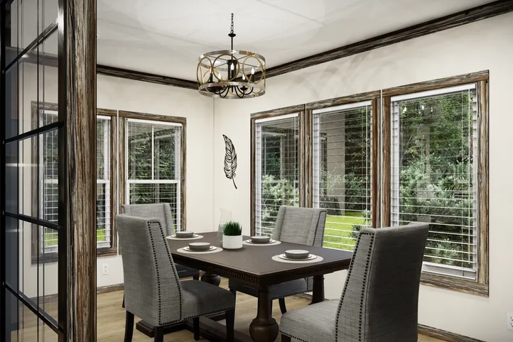 The THE ANDERSON II Dining Room. This Manufactured Mobile Home features 3 bedrooms and 2 baths.