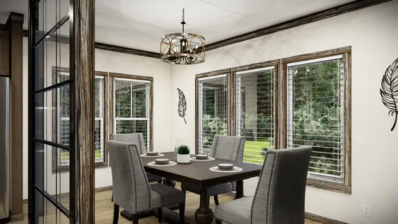 The THE ANDERSON II Dining Room. This Manufactured Mobile Home features 3 bedrooms and 2 baths.
