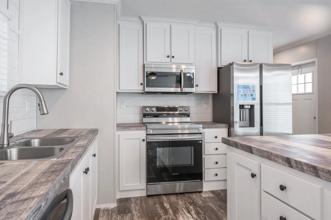 The WILLOW Kitchen. This Manufactured Mobile Home features 3 bedrooms and 2 baths.