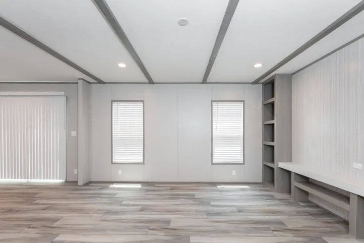 The THE ANNIVERSARY 76 Living Room. This Manufactured Mobile Home features 3 bedrooms and 2 baths.