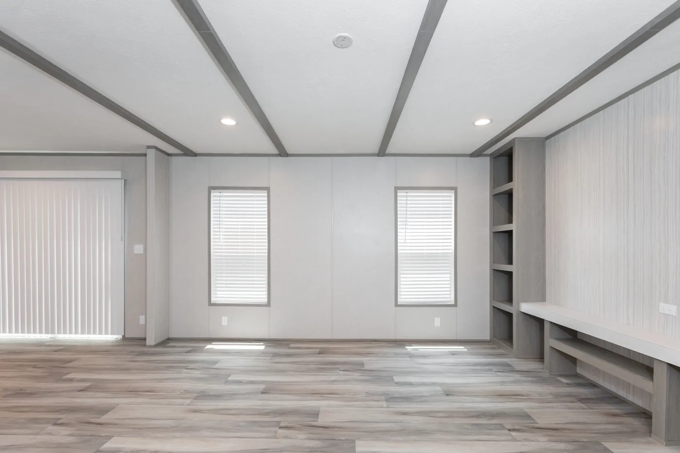 The THE ANNIVERSARY 76 Living Room. This Manufactured Mobile Home features 3 bedrooms and 2 baths.