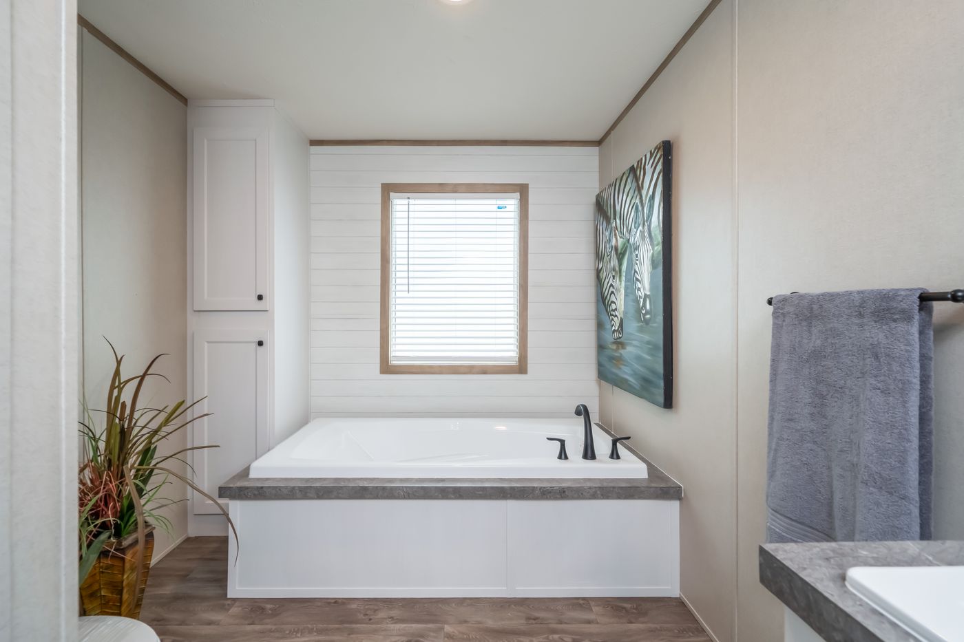 The PT 78 Primary Bathroom. This Manufactured Mobile Home features 3 bedrooms and 2 baths.