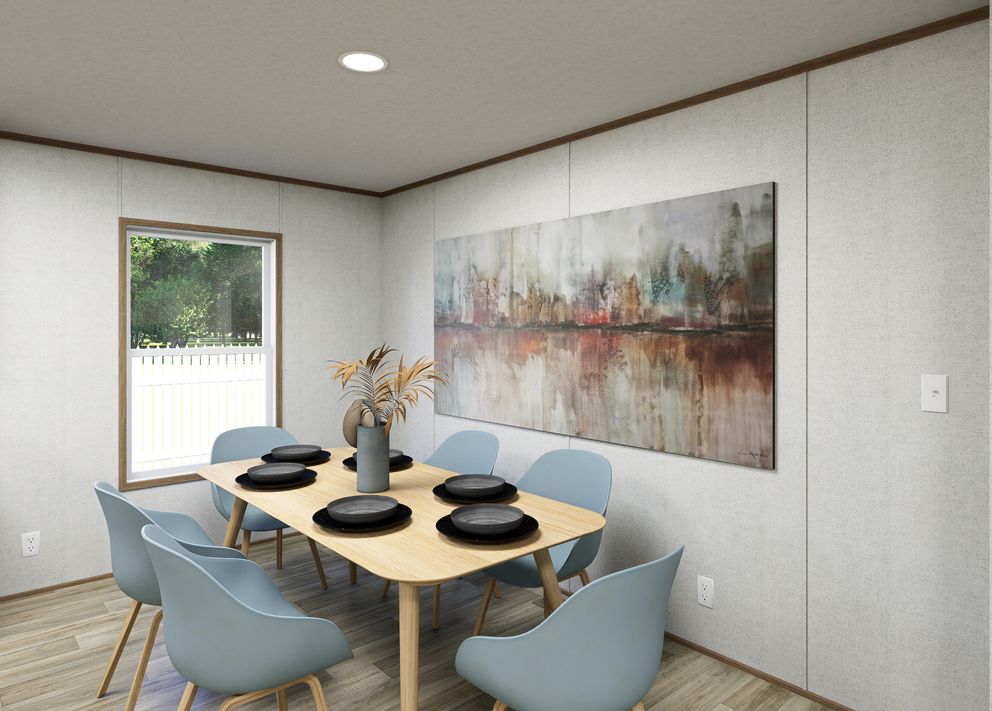 The VISTA Dining Area. This Manufactured Mobile Home features 3 bedrooms and 2 baths.