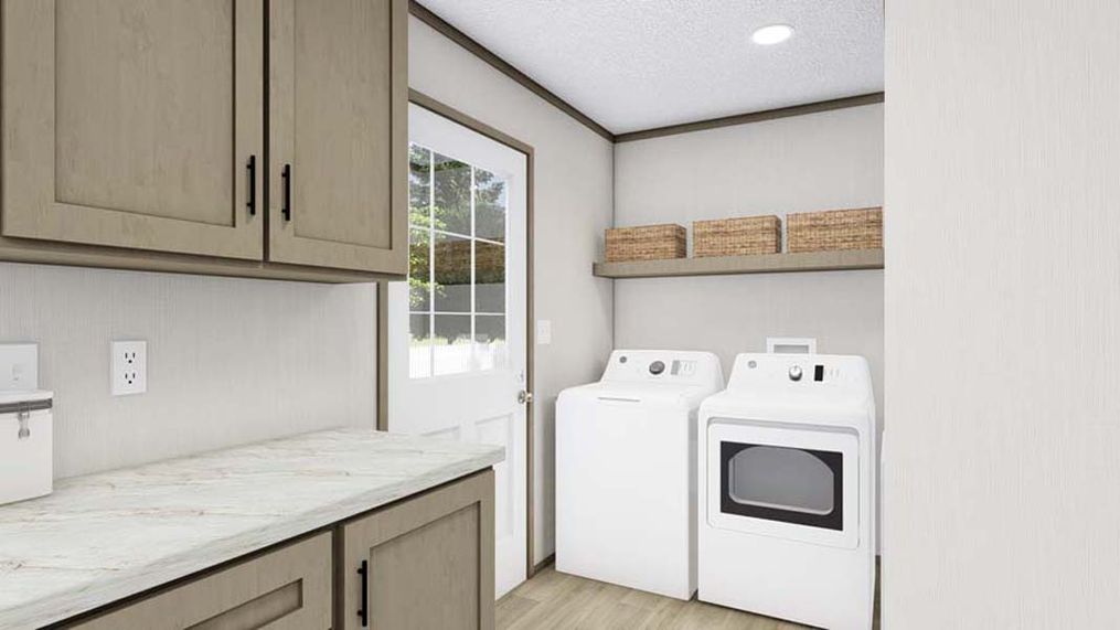 The DRAKE   28X40 Utility Room. This Manufactured Mobile Home features 3 bedrooms and 2 baths.