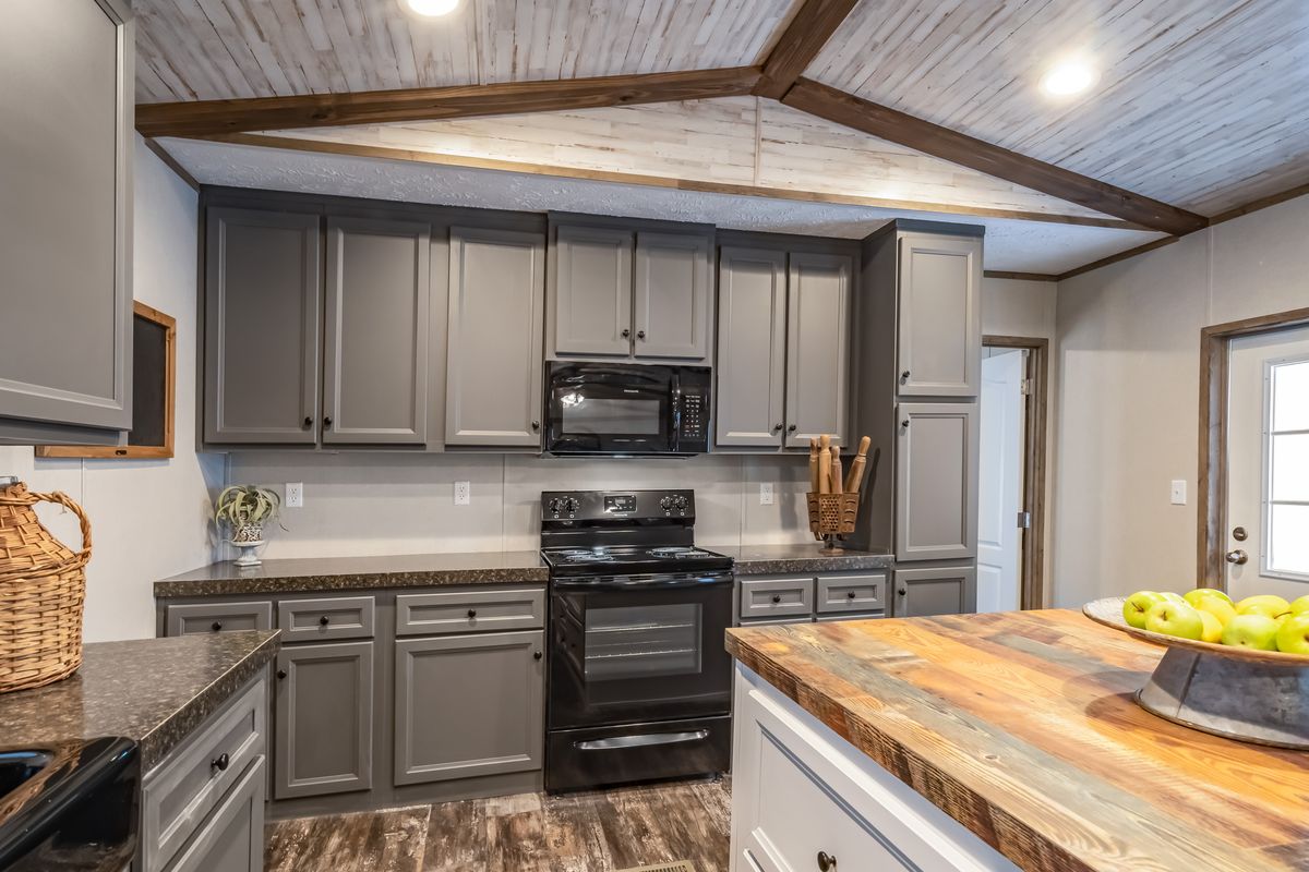 The ALPINE RIDGE Exterior. This Manufactured Mobile Home features 3 bedrooms and 2 baths.