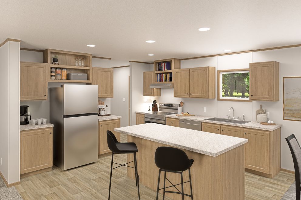 The THE EAGLE 52 Kitchen. This Manufactured Mobile Home features 3 bedrooms and 2 baths.