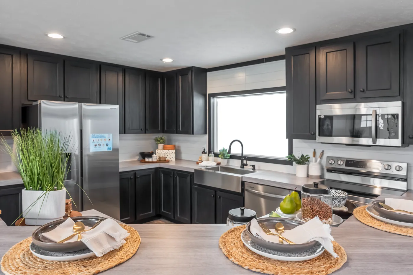 The CRAZY EIGHTS Kitchen. This Manufactured Mobile Home features 4 bedrooms and 2 baths.