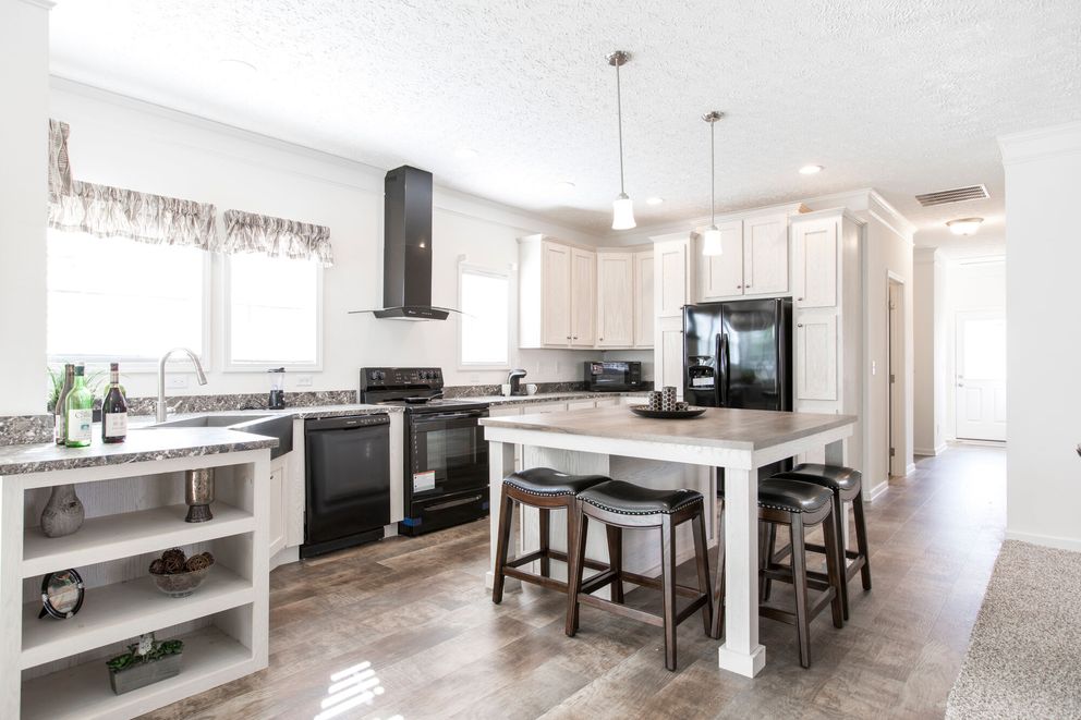 The 1558 JAMESTOWN Kitchen. This Manufactured Mobile Home features 3 bedrooms and 2 baths.