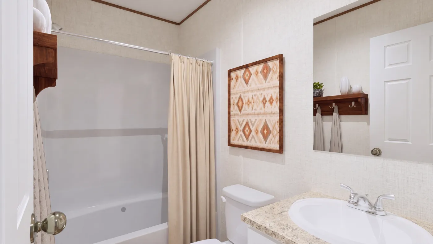 The CEDAR Guest Bathroom. This Manufactured Mobile Home features 3 bedrooms and 2 baths.