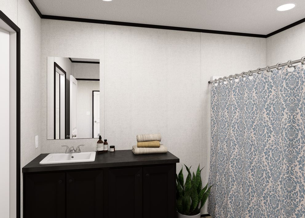 The NORTHSTAR Primary Bathroom. This Manufactured Mobile Home features 3 bedrooms and 2 baths.