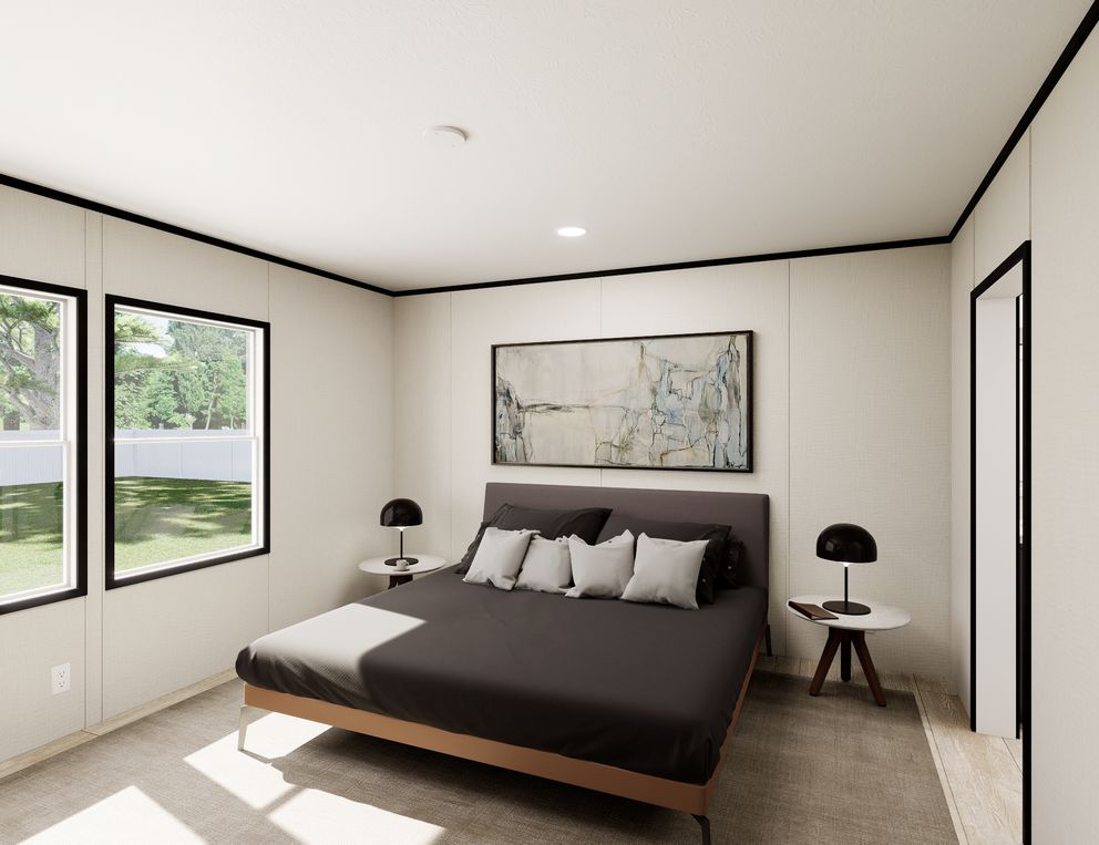 The ULTRA FLEX Primary Bedroom. This Manufactured Mobile Home features 3 bedrooms and 2 baths.