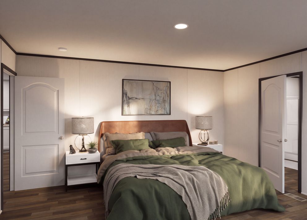 The THE FUSION 32H Primary Bedroom. This Manufactured Mobile Home features 5 bedrooms and 3 baths.