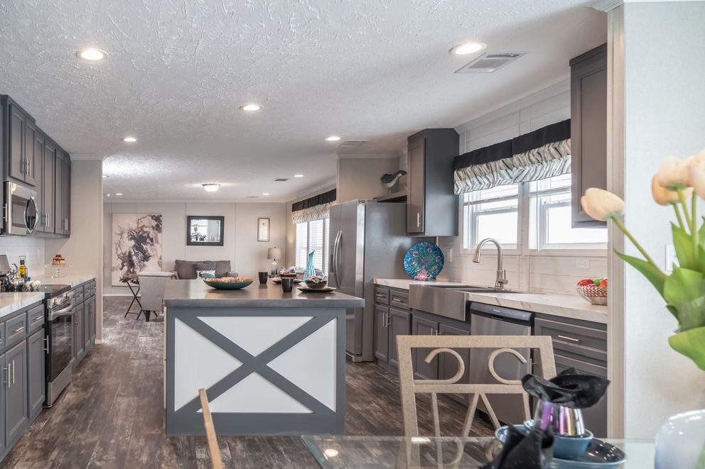 The ALL AMERICAN Kitchen. This Manufactured Mobile Home features 3 bedrooms and 2 baths.