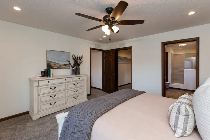The LEGEND 86 Primary Bedroom. This Manufactured Mobile Home features 3 bedrooms and 2 baths.