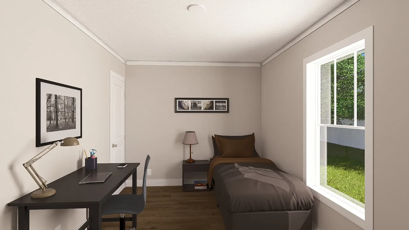 The SWEET CAROLINE Guest Bedroom. This Manufactured Mobile Home features 3 bedrooms and 2 baths.